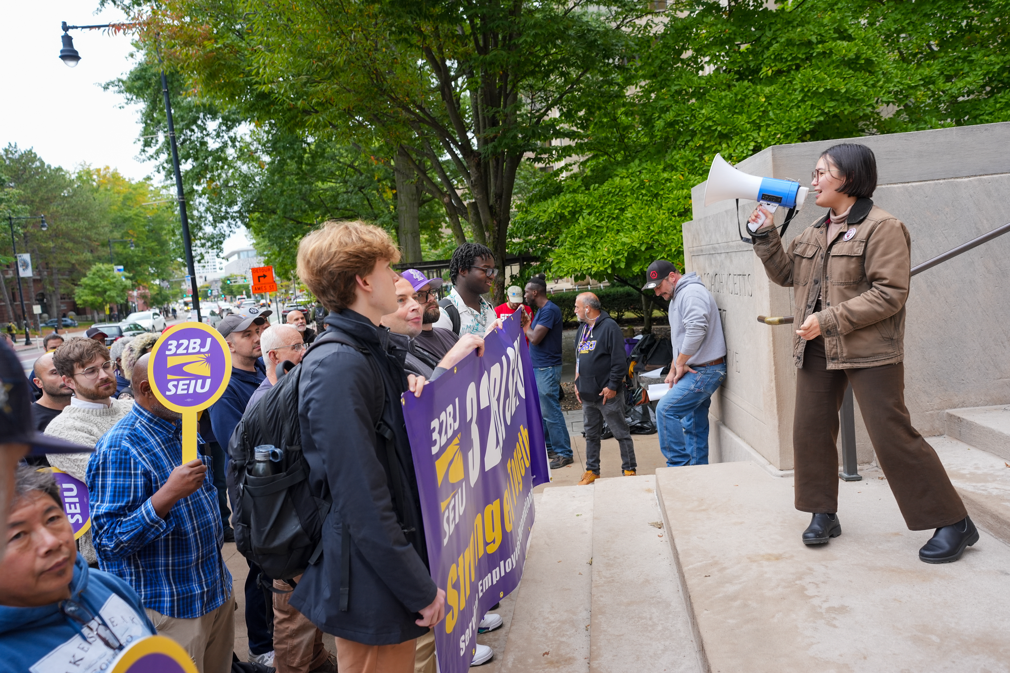 Lauren Chua, MIT-GSU speaks to members of 32BJ SEIU speak in front of the Roger Building at Massachusetts Institute of Technology before delivering a petition to MIT President Sally Kornbluth on September 29, 2026. Photo provided by 32BJ.