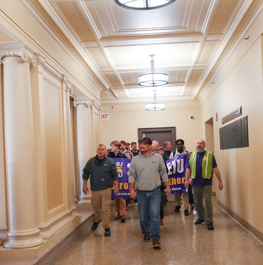 Members of 32BJ SEIU and MIT GSU marched together through MIT after delivering a petition to the office of MIT President Sally Kornbluth on September 29, 2026. Chief Steward Jim Bradford is at the front, in the middle, in a gray hoodie. Photo provided by 32BJ.